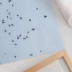 Plakat na płótnie Ptaki w locie