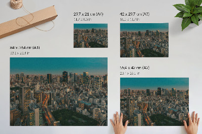 Plakat przedstawiający miejską panoramę
