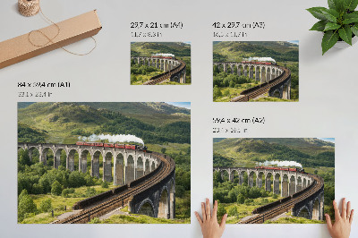 Plakat przedstawiający pociąg na wiadukcie