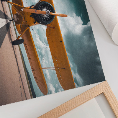 Plakat dekoracyjny przedstawiający startujący samolot