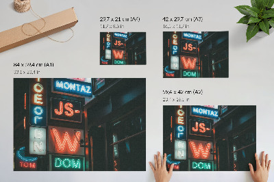 Plakat z motywem neonów w miejskiej scenerii